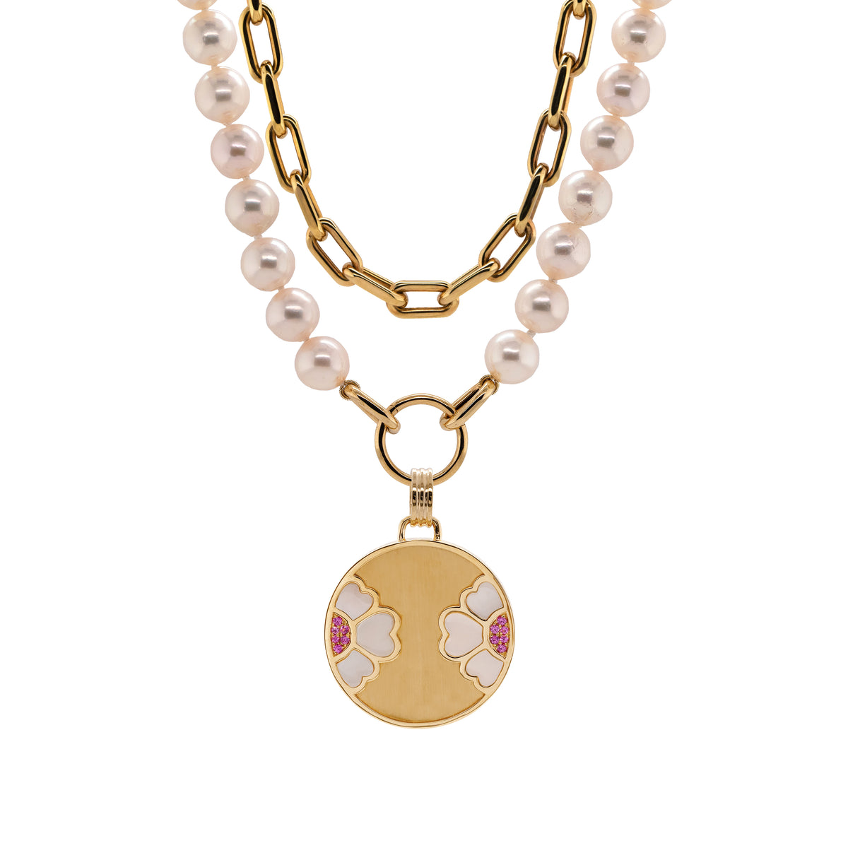 7-7.5mm Akoya Pearl Necklace with the Diptyph Floral Medallion and the Barbara Choker: Pearl necklace with a gold clasp attached to a medallion with a flower design and a 14K gold link chain on a white background