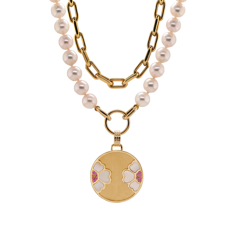 7-7.5mm Akoya Pearl Necklace with the Diptyph Floral Medallion and the Barbara Choker: Pearl necklace with a gold clasp attached to a medallion with a flower design and a 14K gold link chain on a white background
