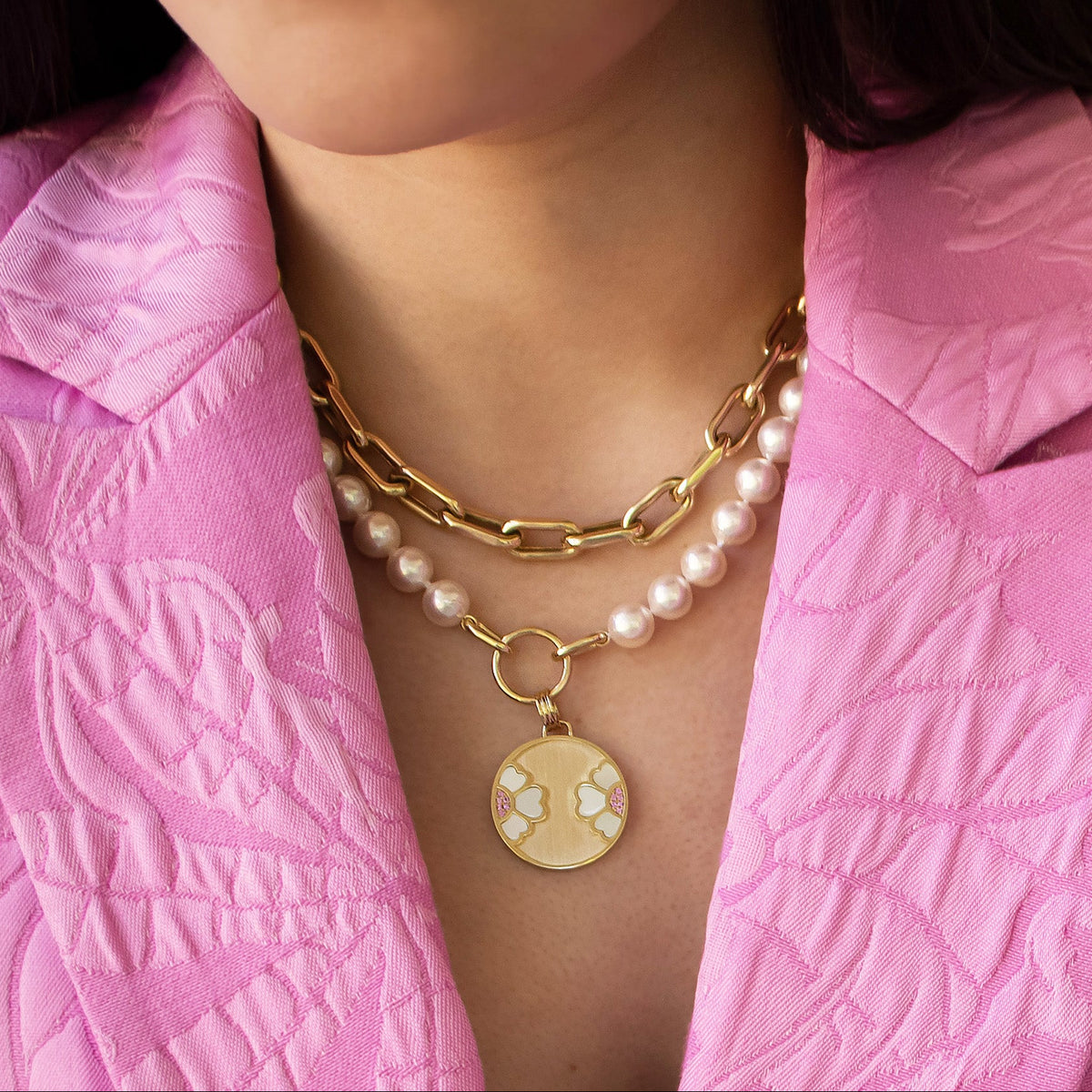 Woman wearing the 7-7.5mm Akoya Pearl Necklace with the Diptyph Floral Medallion and the Barbara Choker