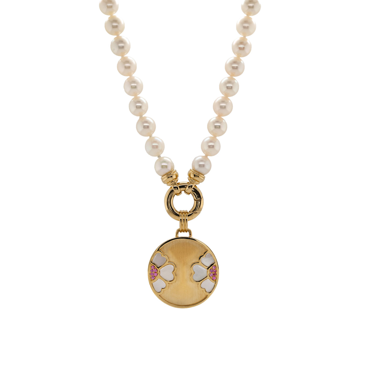 7-7.5mm Akoya Pearl Necklace with the Diptyph Floral Medallion: Pearl necklace with a gold clasp attached to a medallion with a flower design on a white background