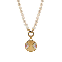 7-7.5mm Akoya Pearl Necklace with the Diptyph Floral Medallion: Pearl necklace with a gold clasp attached to a medallion with a flower design on a white background