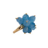 Aquamarine Pom Pom Ring: A gold band ring with a cluster of large aquamarine gemstones made into a flower-shaped centerpiece.