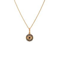 Baby Blue Sapphire Evil Eye Medallion Necklace: A gold chain necklace with blue sapphires and diamonds in an evil eye design medallion, set against a white background.
