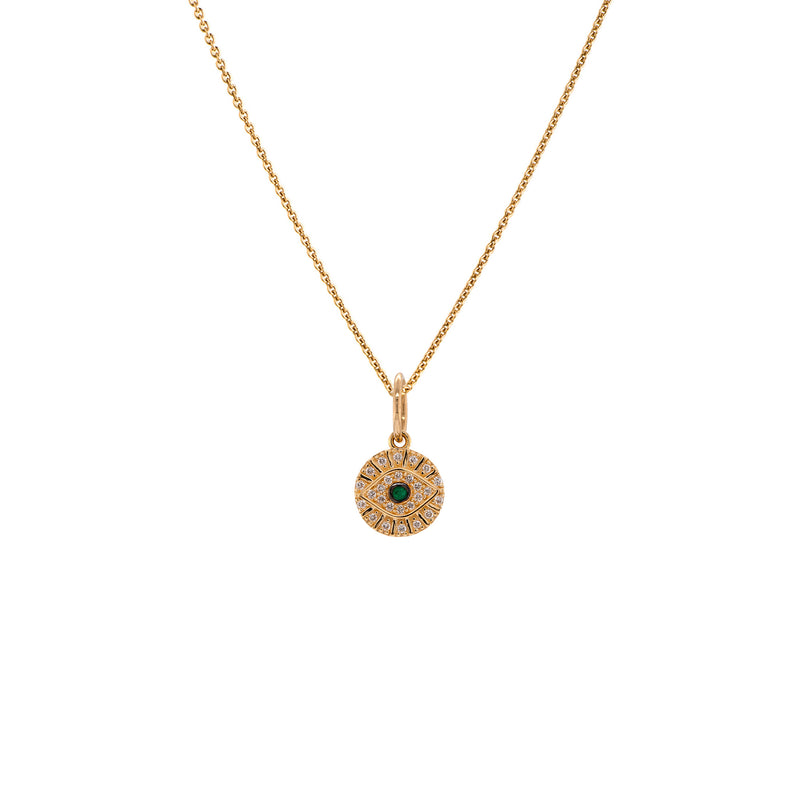 Baby Diamond Evil Eye Necklace: A 14K gold diamond pendant with a central emerald, surrounded by a circle of small diamonds, attached to a gold chain.