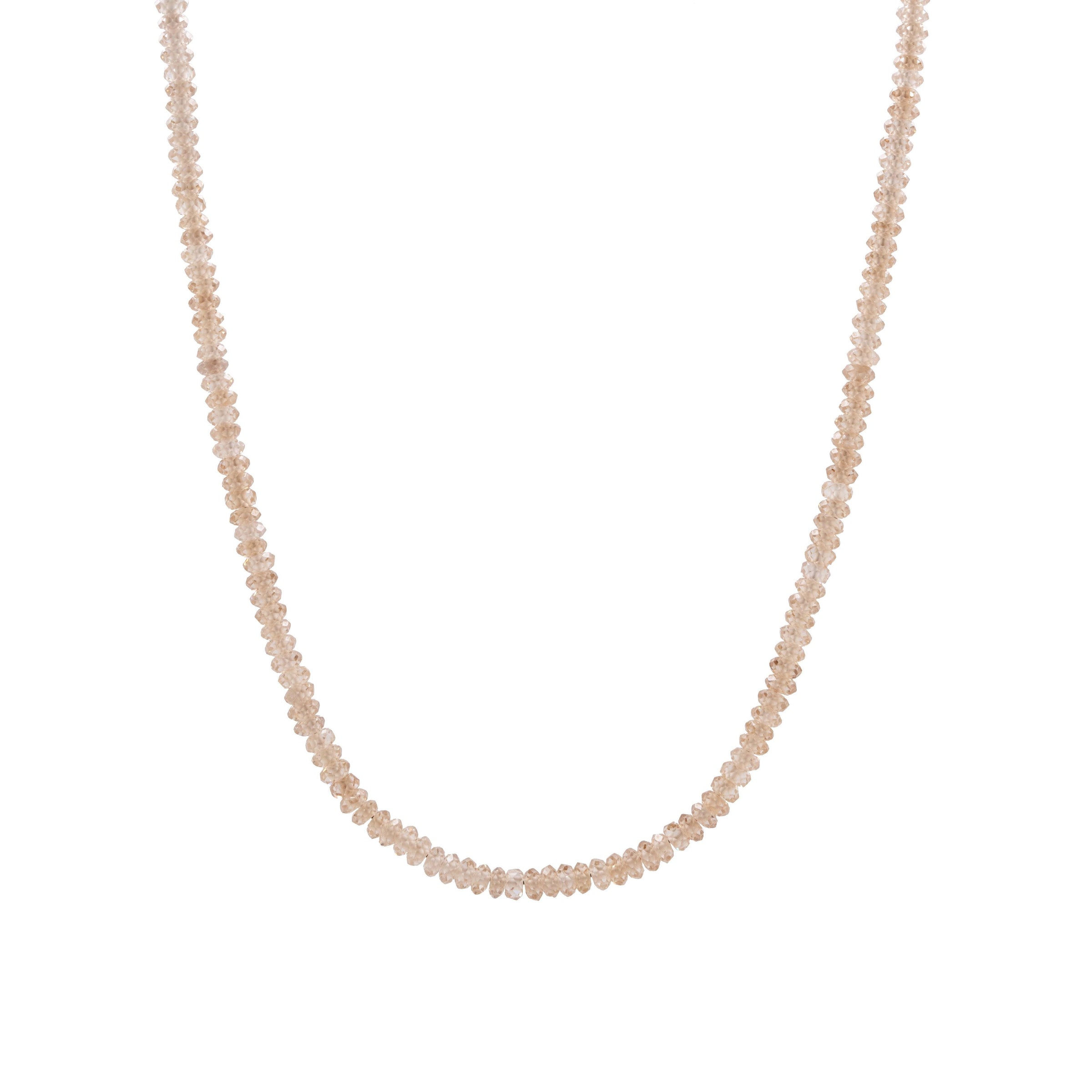 Champagne Natural Zircon 3mm Necklace: Champagne colored beaded Necklace with small beads on a white background
