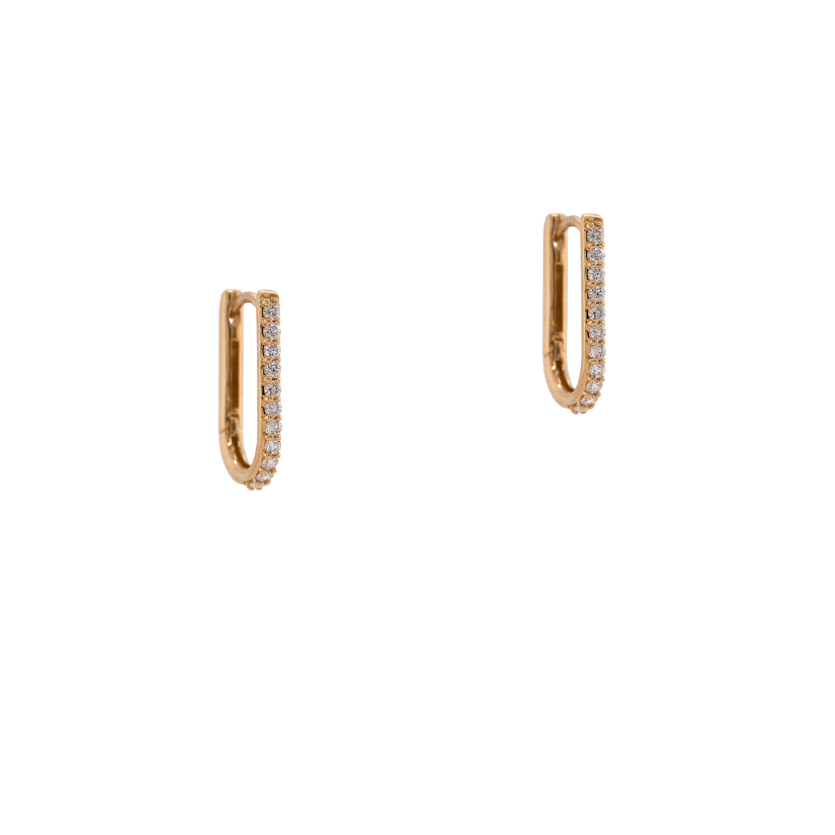 Diamond Oval Huggies: A pair of 14K gold oval huggie earrings with diamond accents.