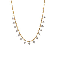 Diamond Petal Necklace: A 14K gold necklace with a series of round diamond petals attached to a lobster clasp.