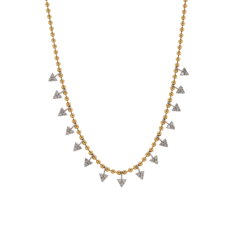 Diamond Petal Necklace: A 14K gold necklace with a series of round diamond petals attached to a lobster clasp.