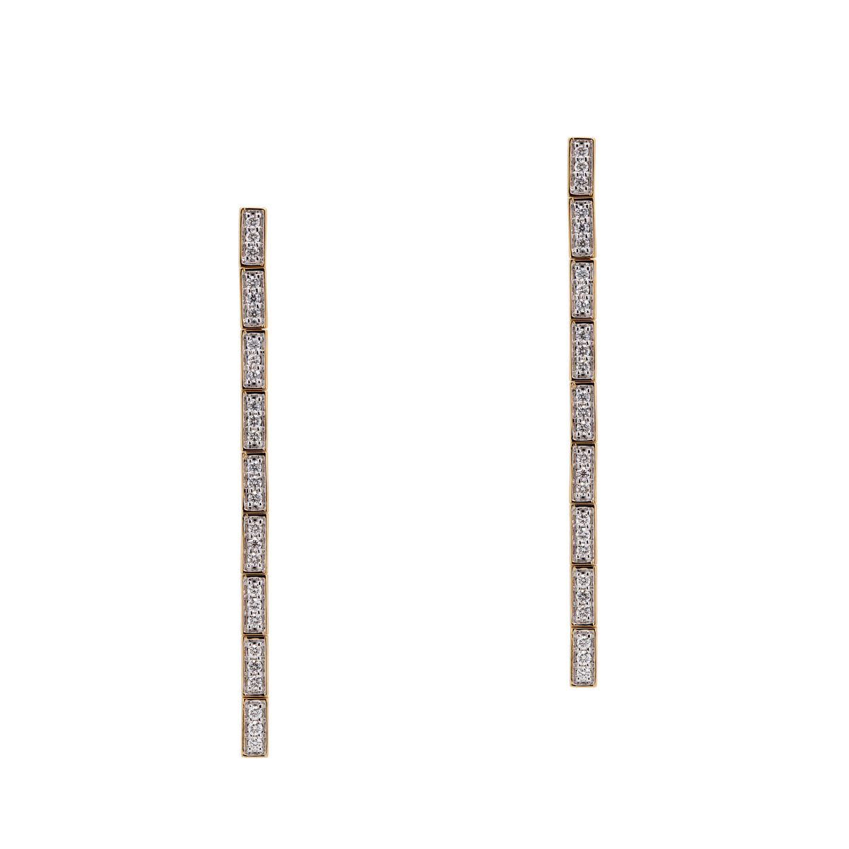 Diamond Serpent Earrings: A pair of 14K gold diamond earrings with a serpentine design, featuring a series of small, rectangular-shaped diamonds set.