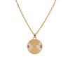 Diptyph Floral Medallion Necklace: 14K gold necklace with a medallion with a flower design on a white background