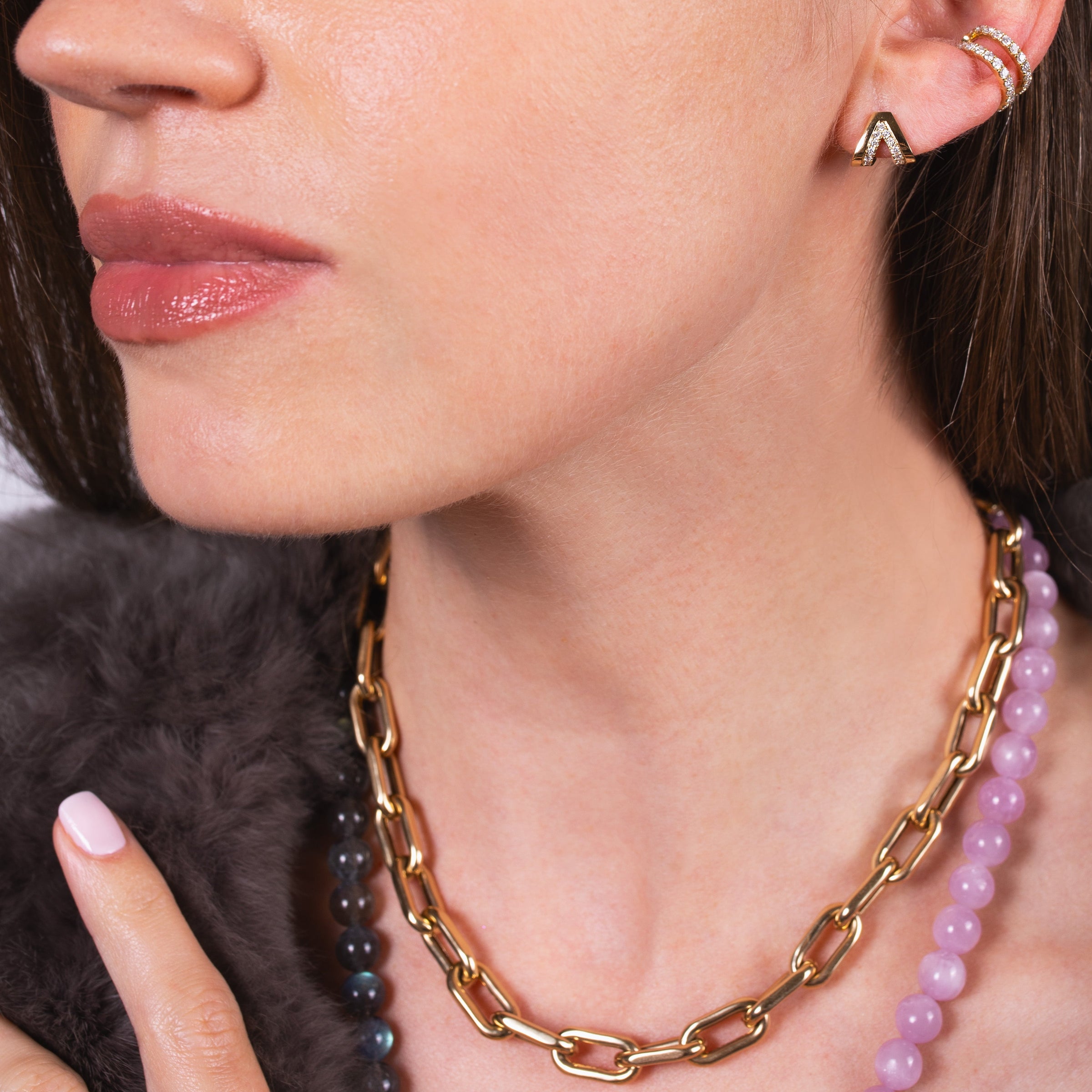Women wearing the Double Arrow Studs, and Open Bar Diamond Ear Cuff