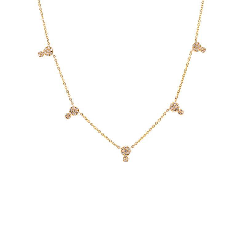 Double Dot Necklace: A 14K yellow gold chain necklace with a lobster clasp fastening, featuring a series of double round diamond charms.