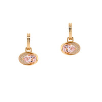 Front view of Double Joy Earrings, which are gold huggies with drops of morganite stones and diamonds on a white background