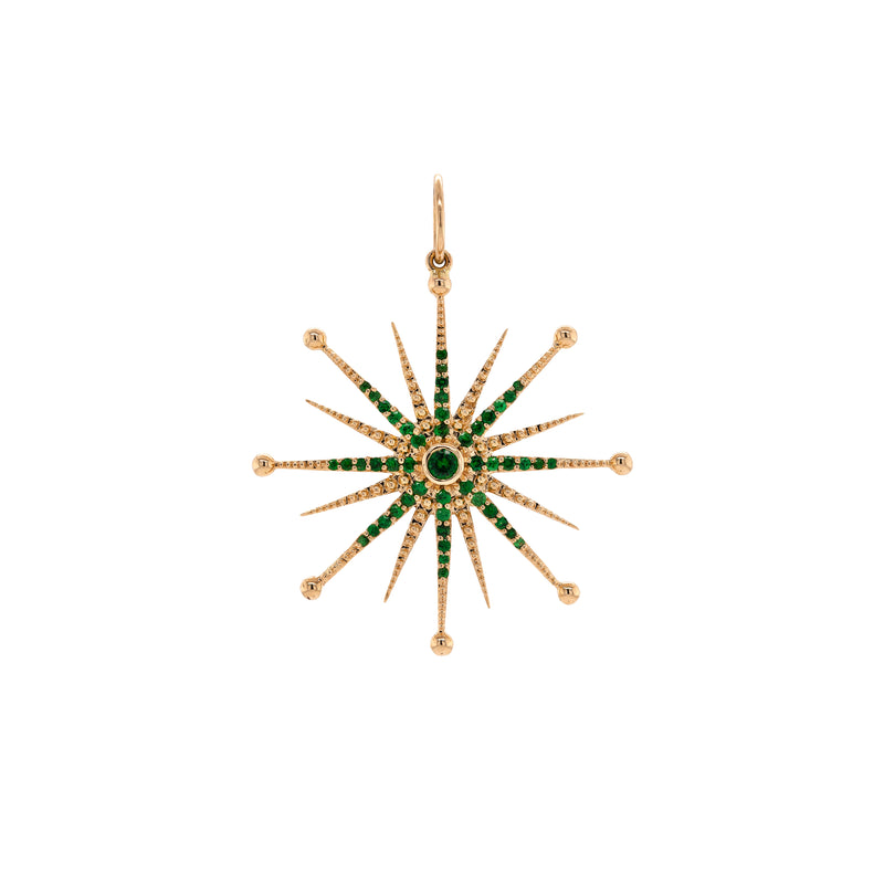 Emerald Nebula Pendant: A 14K gold emerald pendant with a star-shaped design, featuring multiple emeralds set in a yellow gold frame.
