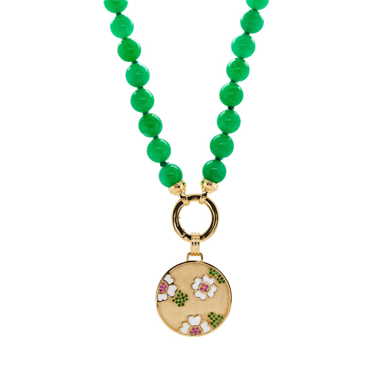 Garden Medallion Burmese Jade Necklace: A gold medallion with a floral garden pattern on a chain of green jade beads.