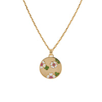 Garden Medallion Necklace: A gold medallion with a floral garden pattern on a yellow gold chain.