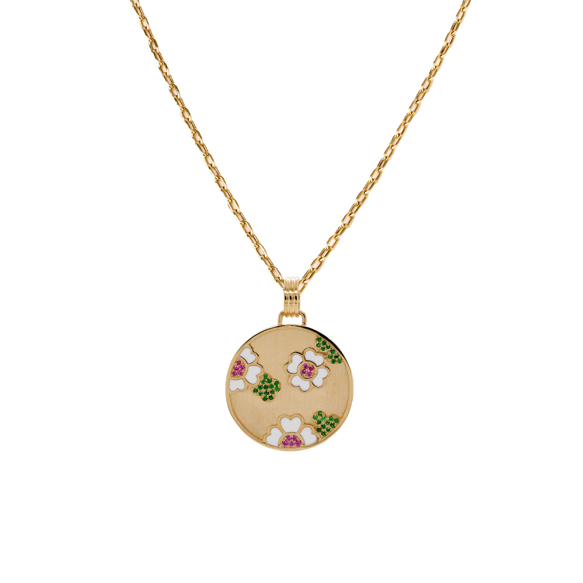 Garden Medallion Necklace: A gold medallion with a floral garden pattern on a yellow gold chain.