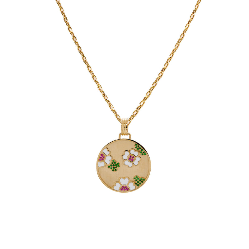 Garden Medallion Necklace: A gold medallion with a floral garden pattern on a yellow gold chain.