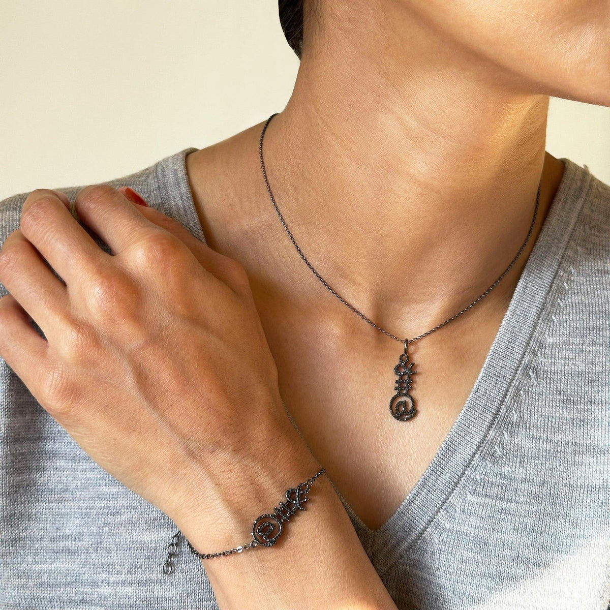 AMPERSAND BLACK DIAMOND BRACELET