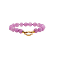  Kunzite Bracelet: A bracelet with a gold-tone clasp, featuring a series of pink oval-shaped beads 