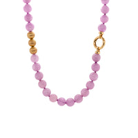 Kunzite Necklace: A necklace with purple pink round beads and gold beads, featuring a gold ring clasp.