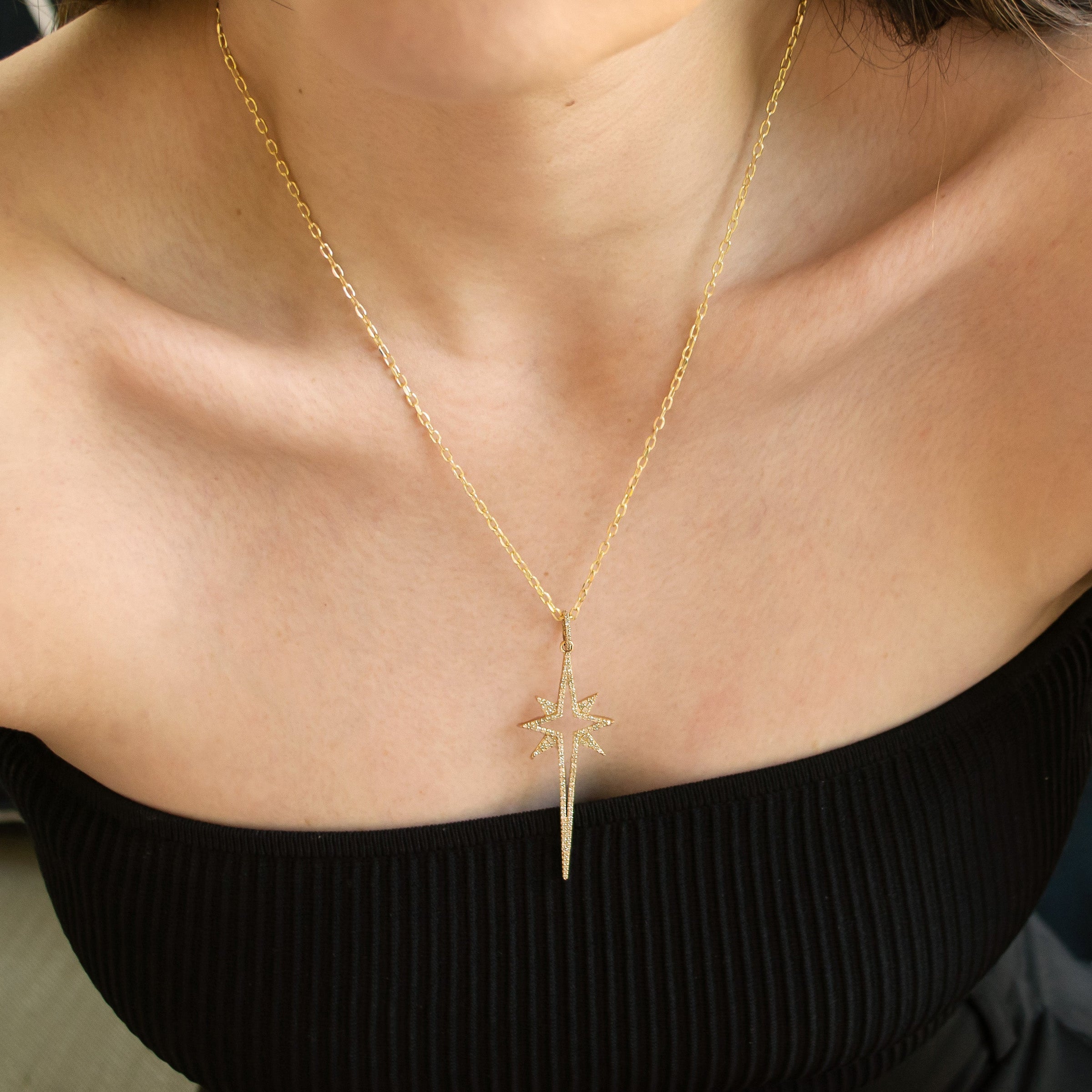 Woman wearing the Large Starburst Necklace