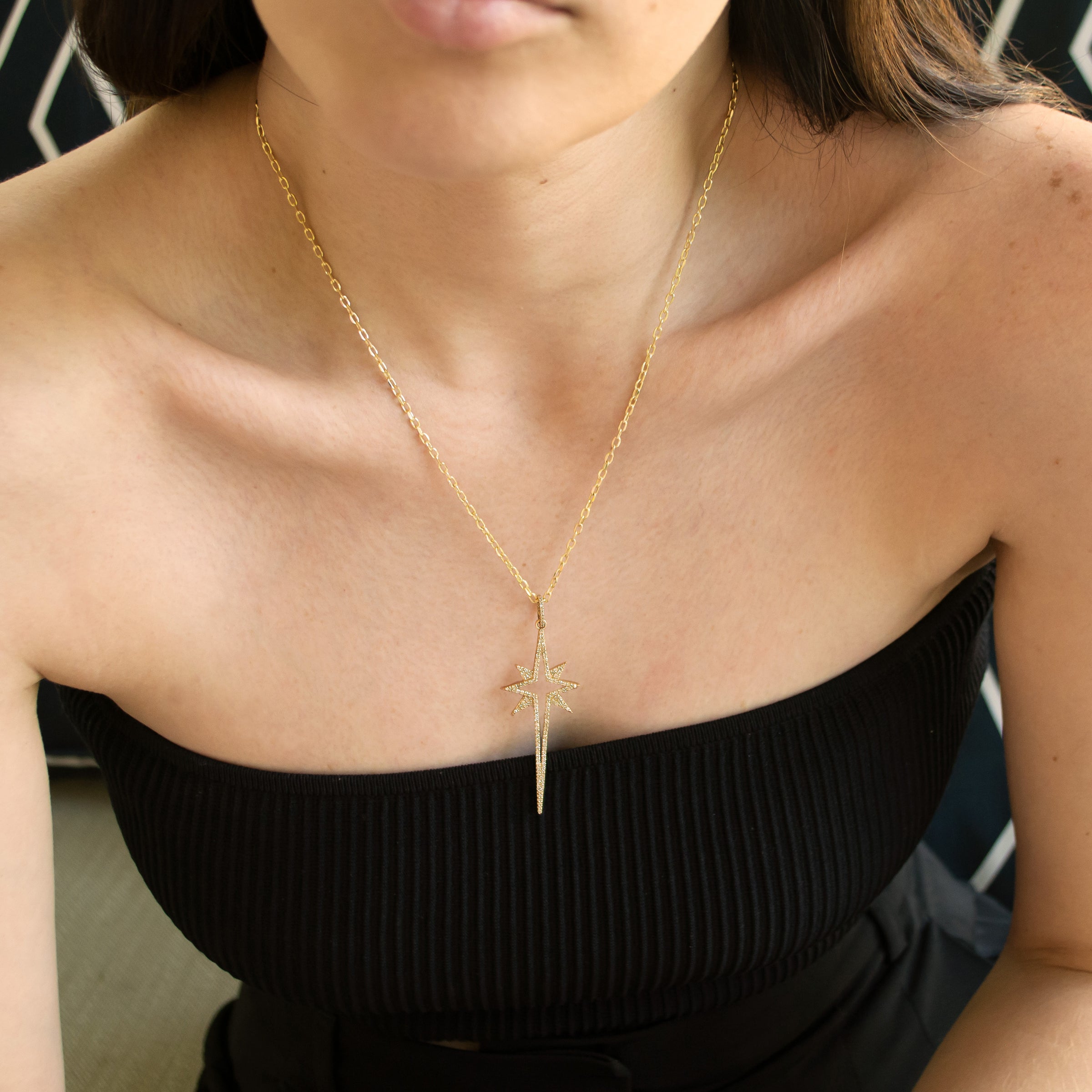 Woman wearing the Large Starburst Necklace