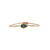 London Blue Topaz Liquid Teardrop Bracelet, 14K gold bracelet with a blue gemstone on a white background