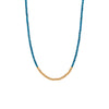 London Blue Topaz Necklace, Necklace with blue and gold beads on a white background