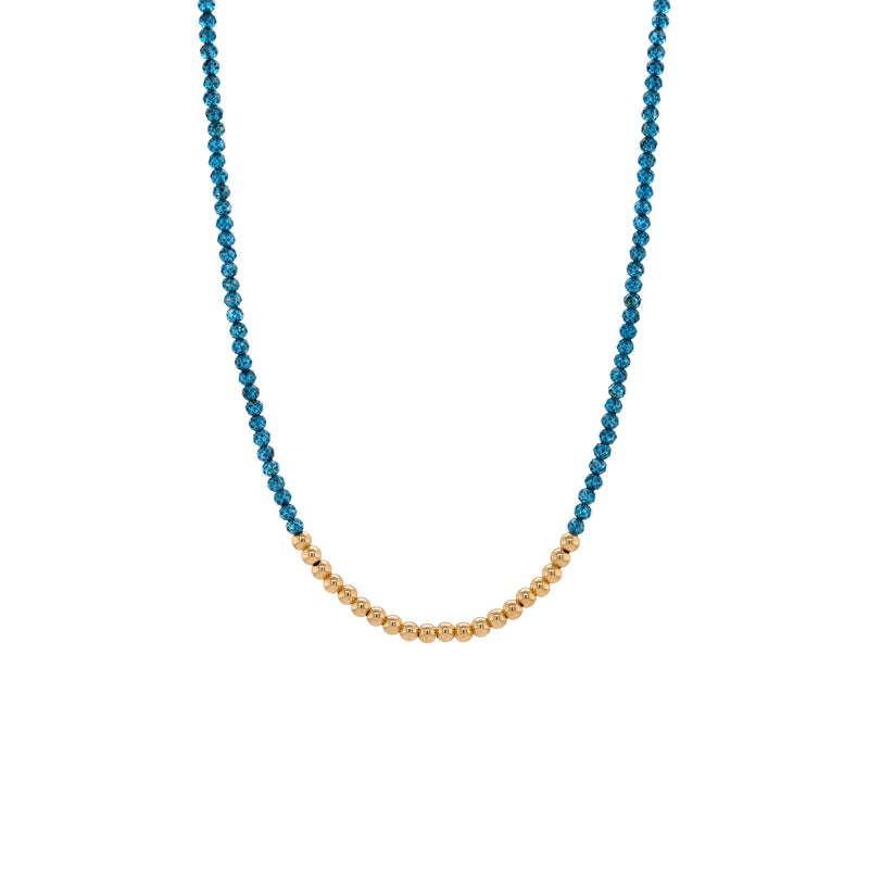 London Blue Topaz Necklace, Necklace with blue and gold beads on a white background