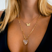 Woman wearing the Loving Life Heart Necklace and the Butterfly Necklace