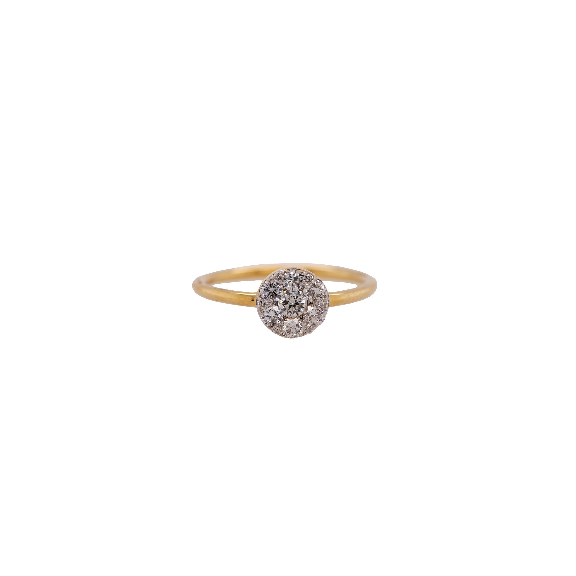 Medium Illusion Round Diamond Ring: 14K Gold ring with a round diamond on a white background