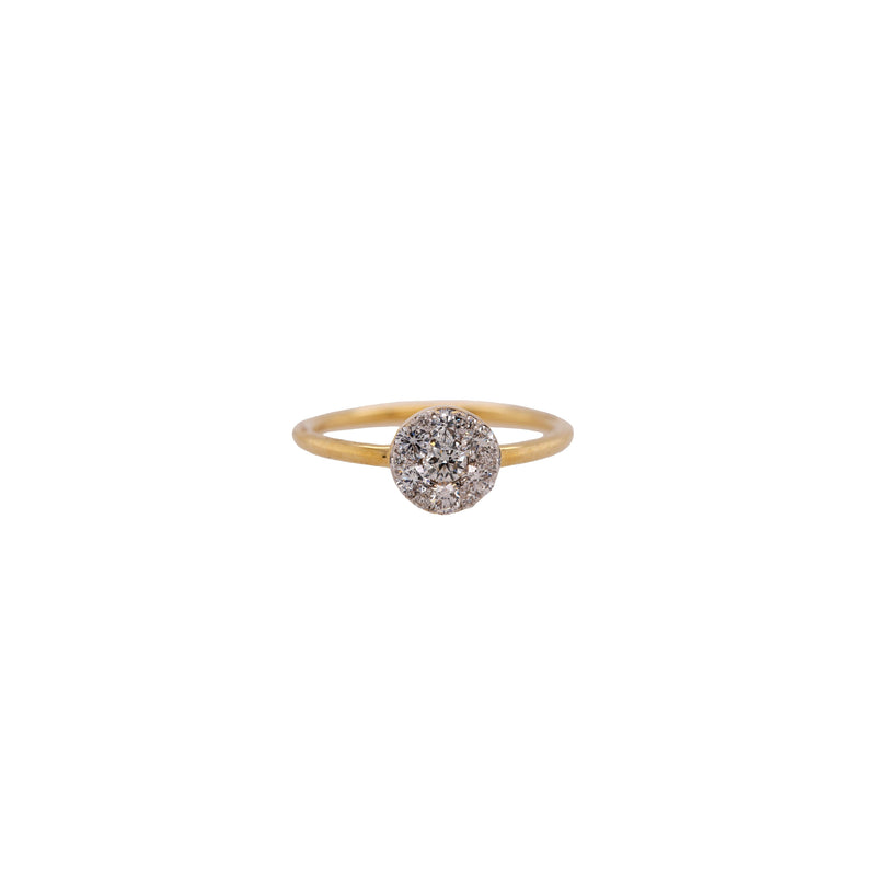 Medium Illusion Round Diamond Ring: 14K Gold ring with a round diamond on a white background