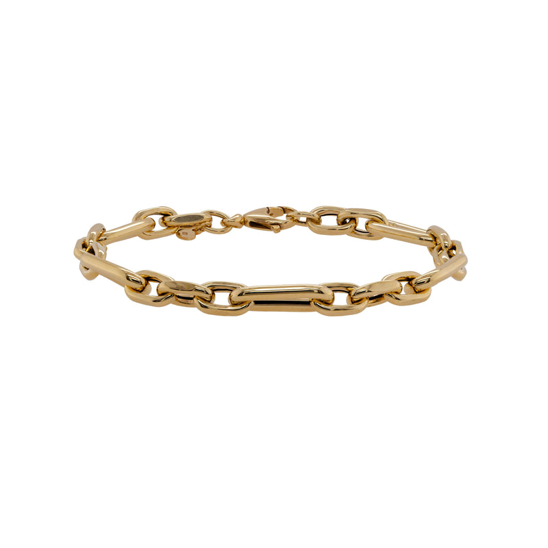 Medium Multi-Link Bracelet: 14K Gold mixed chain bracelet on a white background