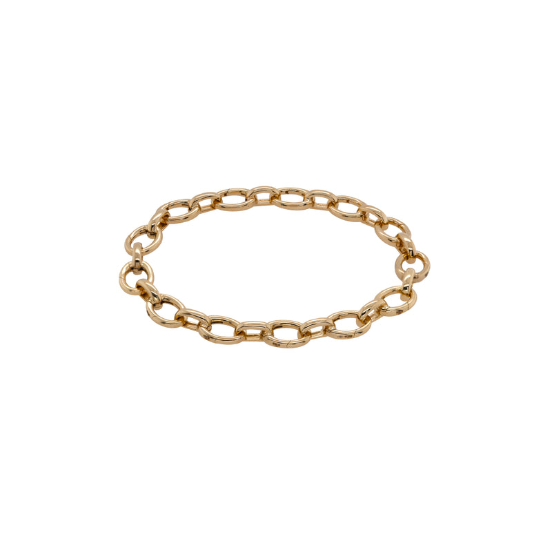 Oval Link Charm Bracelet, a 14K gold bracelet with oval links that can open to add charms