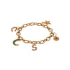 Oval Link Charm Bracelet with Charms, a gold bracelet with oval links and various charms, including a star and a letter.
