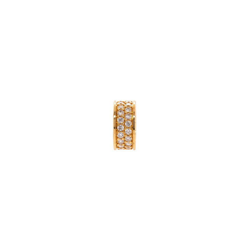 Pavé Diamond Rondelle, Gold rondelle with embedded white stones on a white background