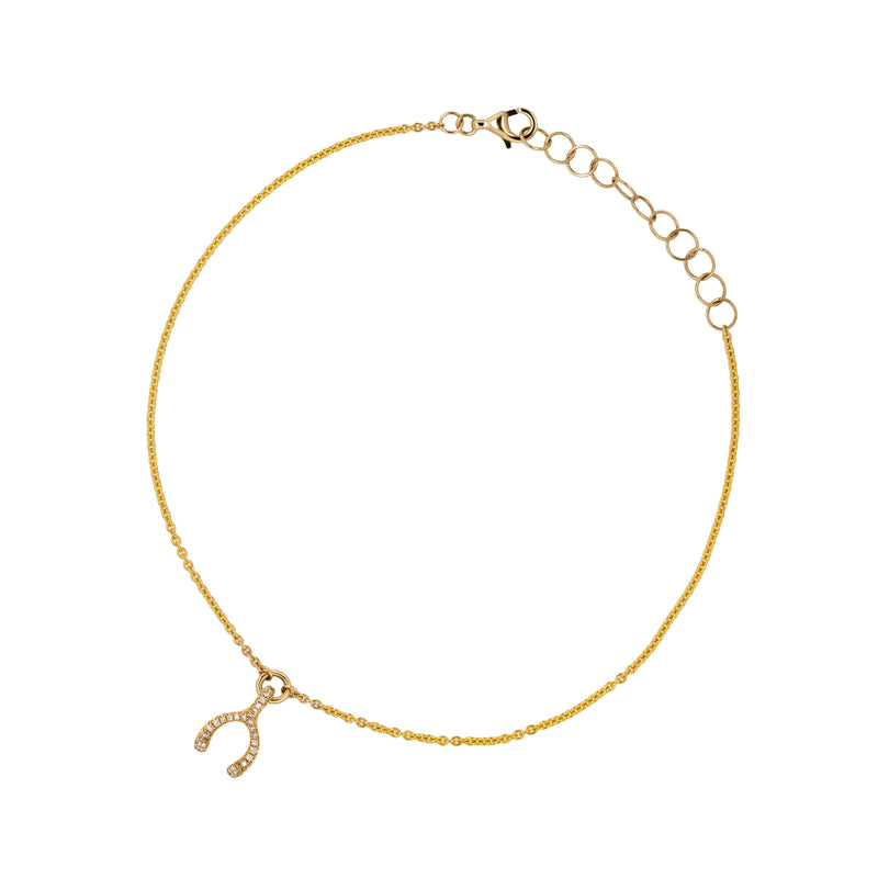 Pavé Diamond Wishbone Anklet: 14K gold anklet with a small diamond wishbone pendant on a white background