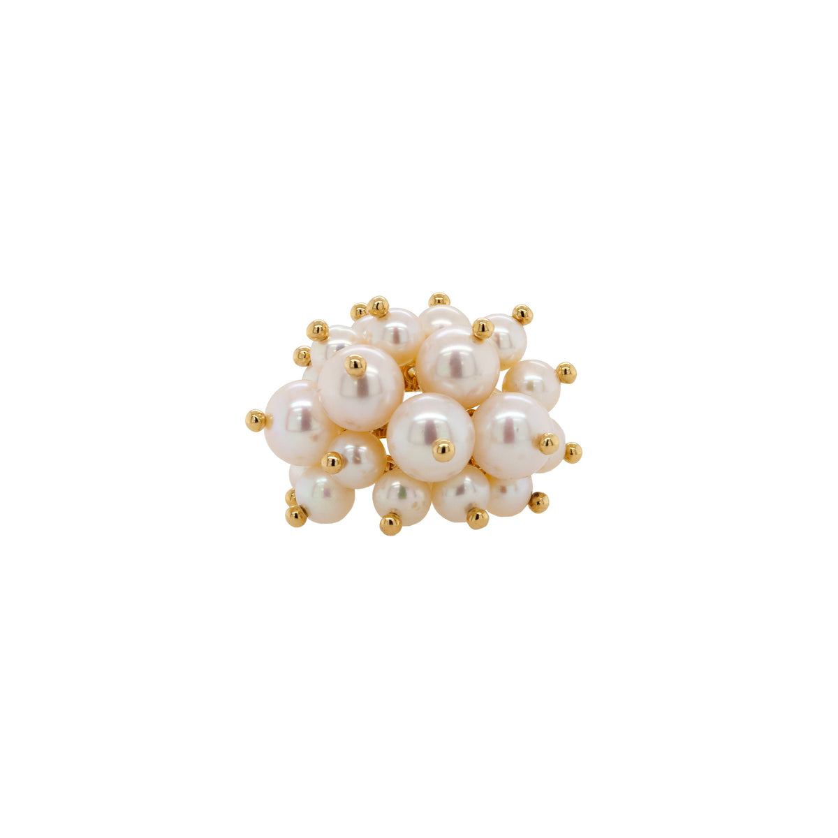 Pearl Pom Pom Ring: A gold ring with a cluster of white pearls on it, set against a white background.