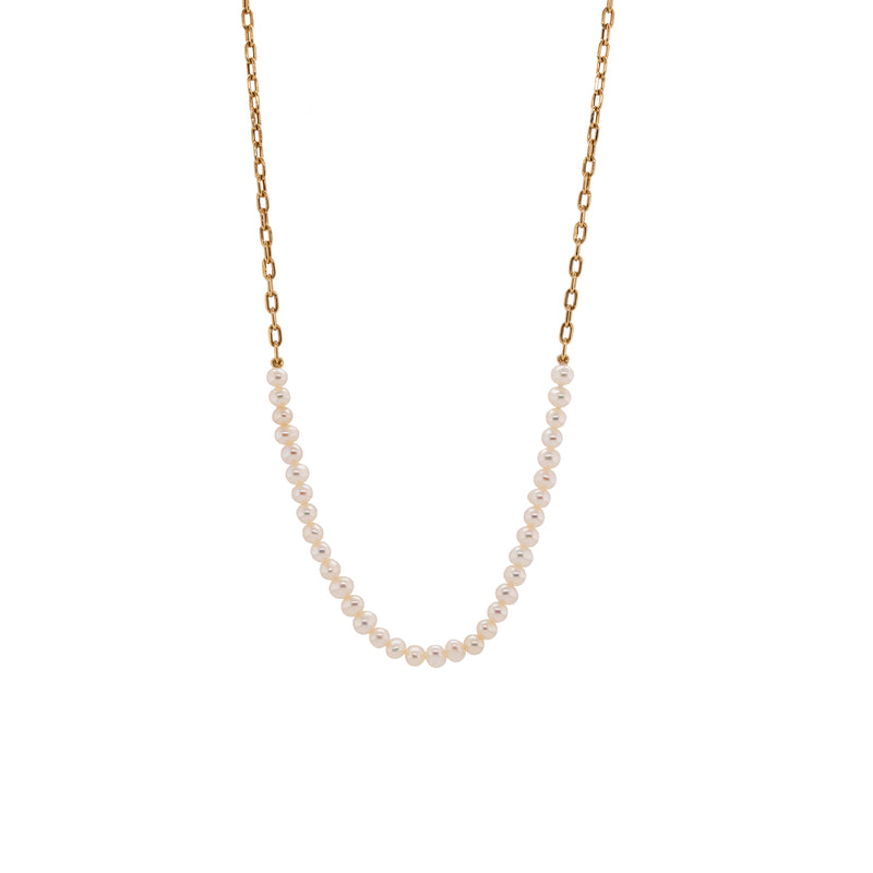 Pearl Row Necklace: A 14K gold necklace with freshwater pearls, featuring a lobster clasp fastening.