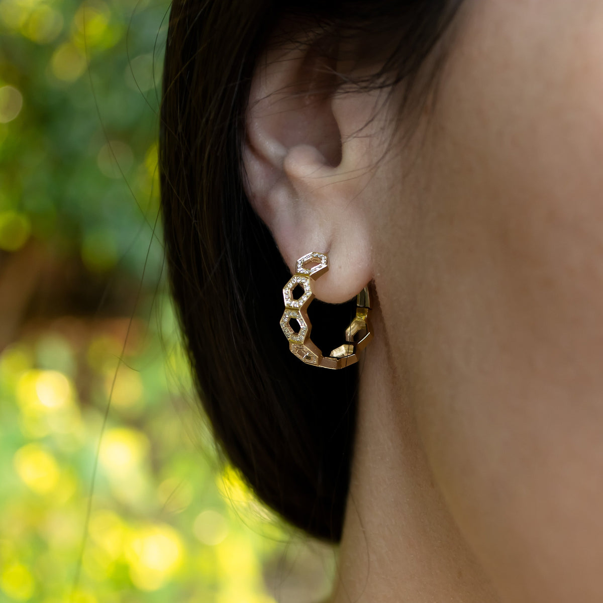 Close up of the Prism Hoops on the ear