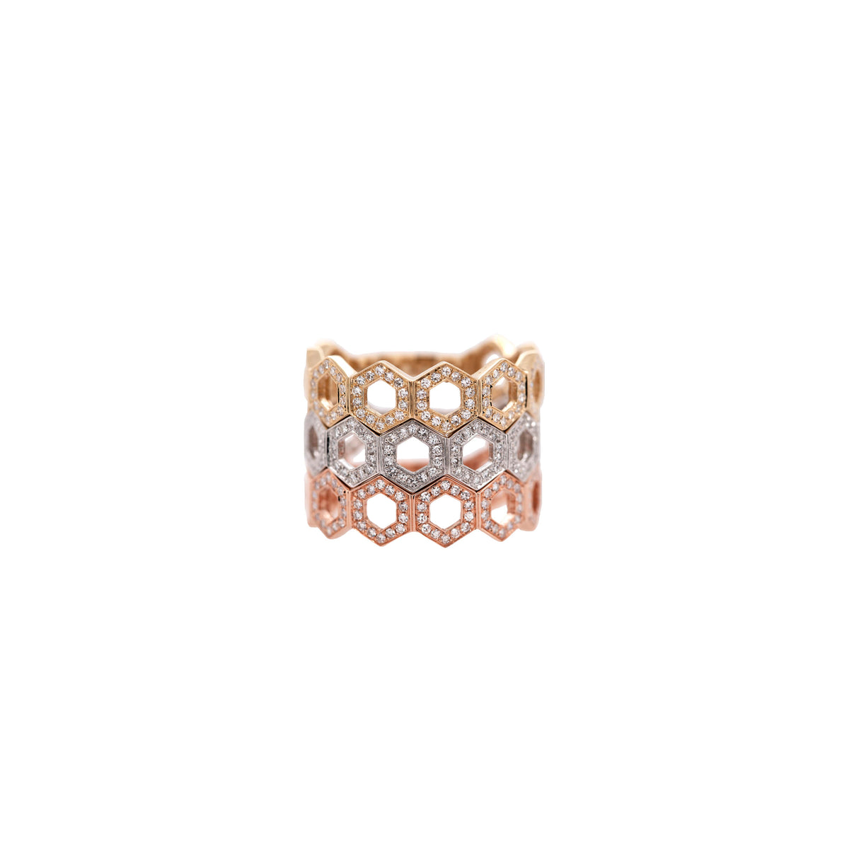 All three Prism Stackable Rings stacked: A 14K gold, intricately designed stackable ring with a geometric pattern.