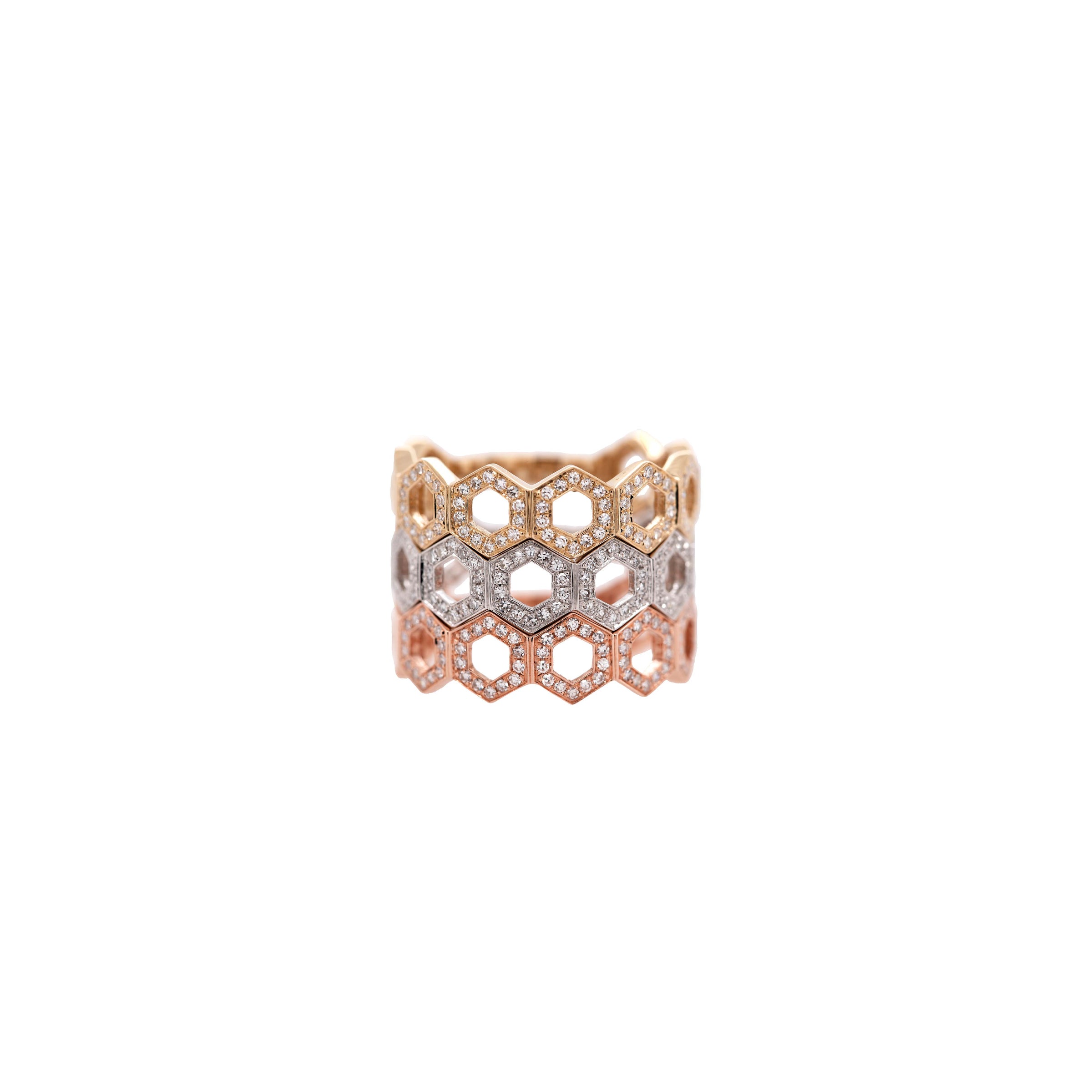 All three Prism Stackable Rings stacked: A 14K gold, intricately designed stackable ring with a geometric pattern.