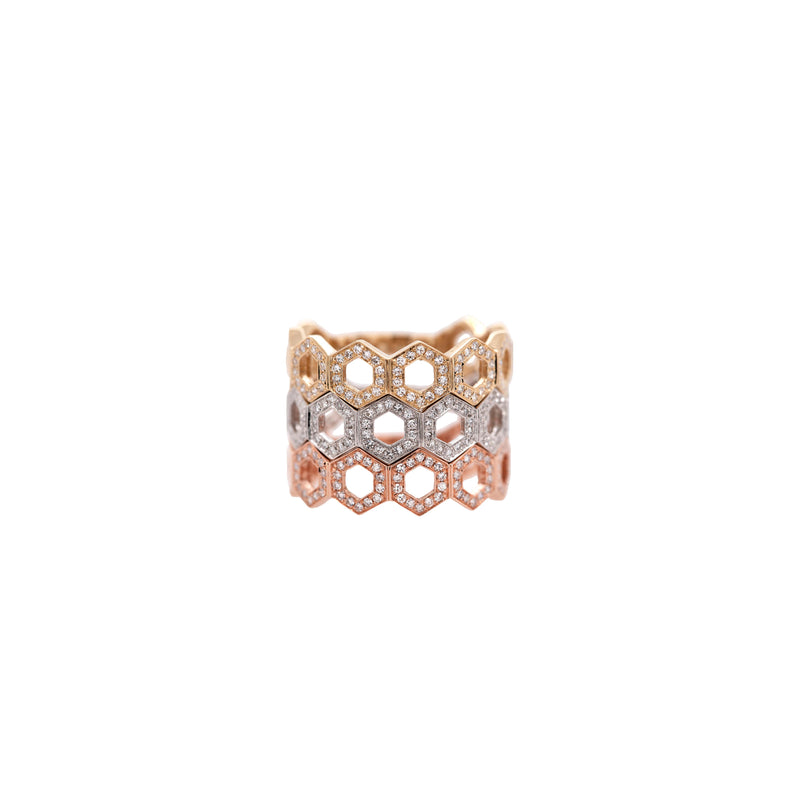 All three Prism Stackable Rings stacked: A 14K gold, intricately designed stackable ring with a geometric pattern.