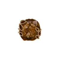 Rutilated Cocktail Ring: A 14K gold cocktail ring featuring a large rutilated quartz centerpiece with a yellow band.
