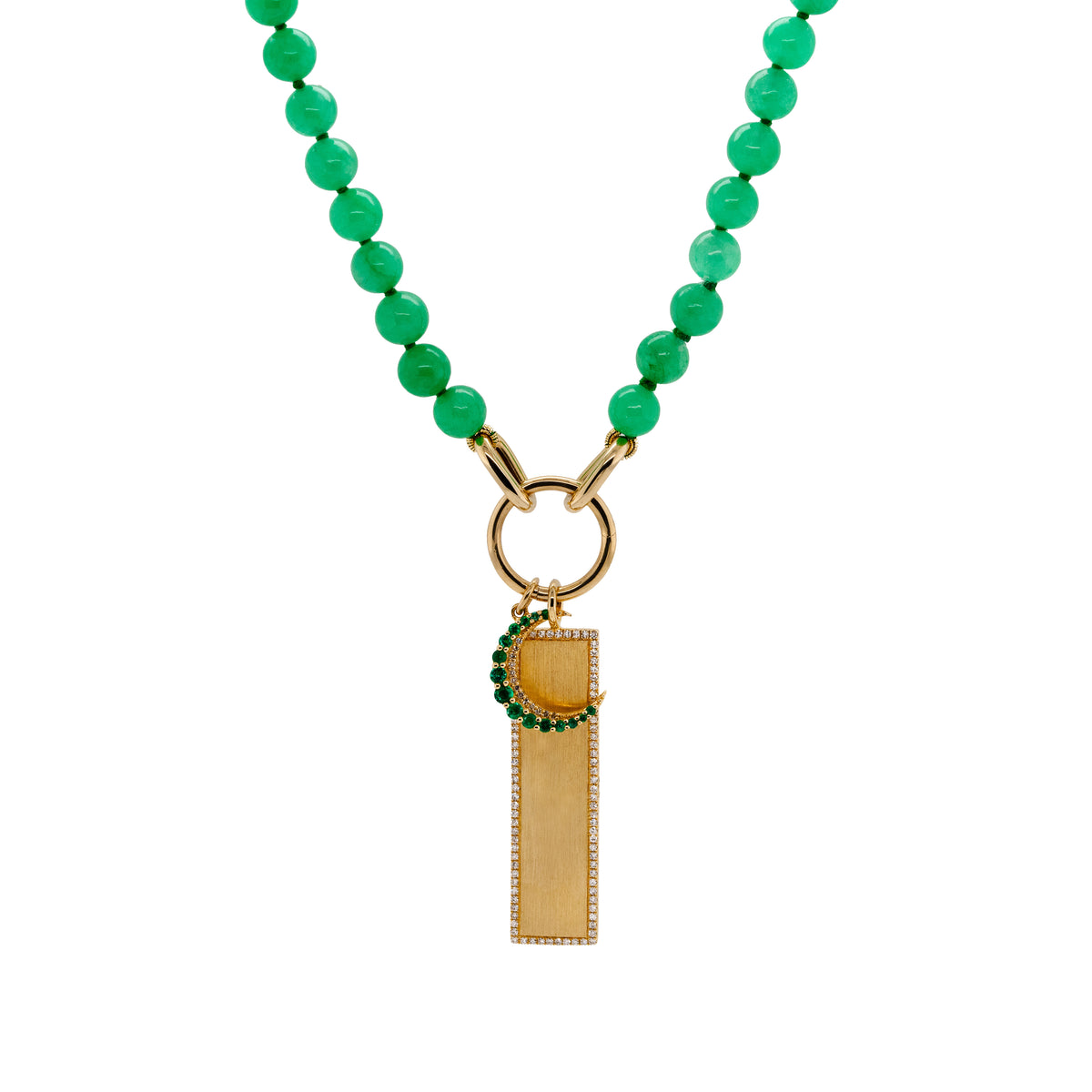 A green Burmese jade necklace with the small emerald crescent pendant and a white diamond dog tag pendant in 14K yellow gold.