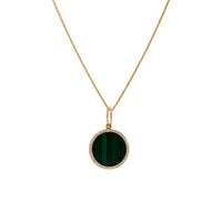 Small Malachite MedallionNecklace: A gold necklace featuring a round medallion with a green malachite stone in the center, surrounded by smaller diamonds with a chain.