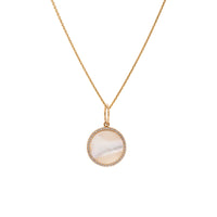Small Mother-of-pearl Medallion Necklace: A 14K gold medallion pendant featuring a central mother-of-pearl surrounded by small diamonds, with a chain.