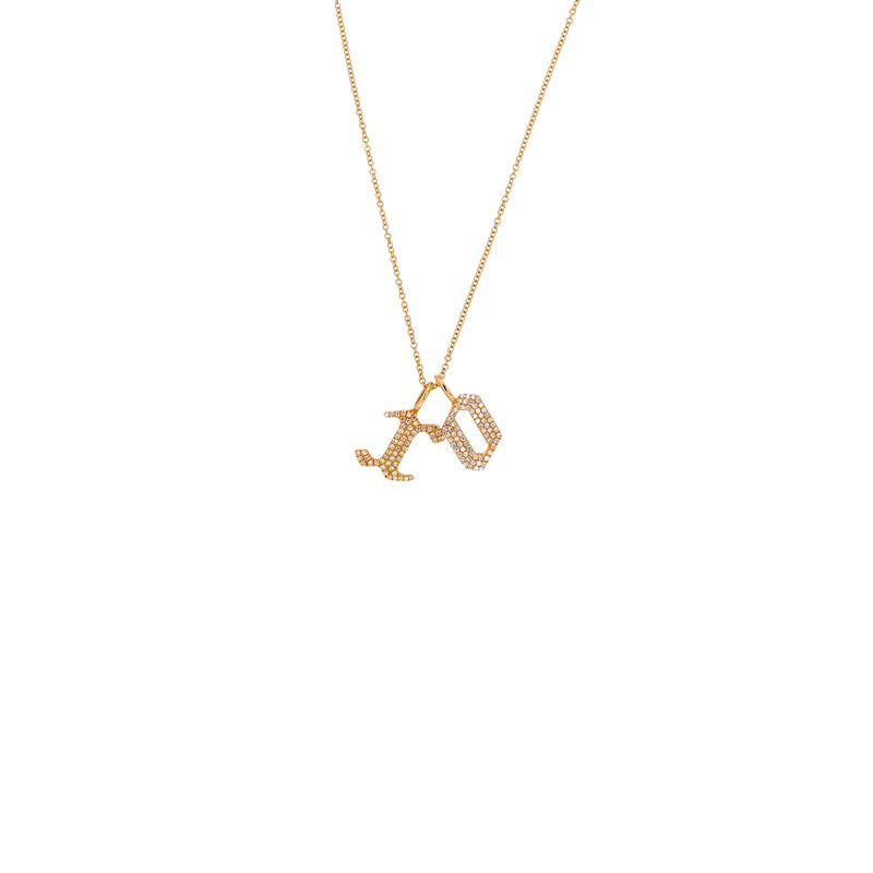 A 14K yellow gold charm necklace with two charms, one with the letter 'X' and another with the letter 'O', on an 18-inch adjustable chain.