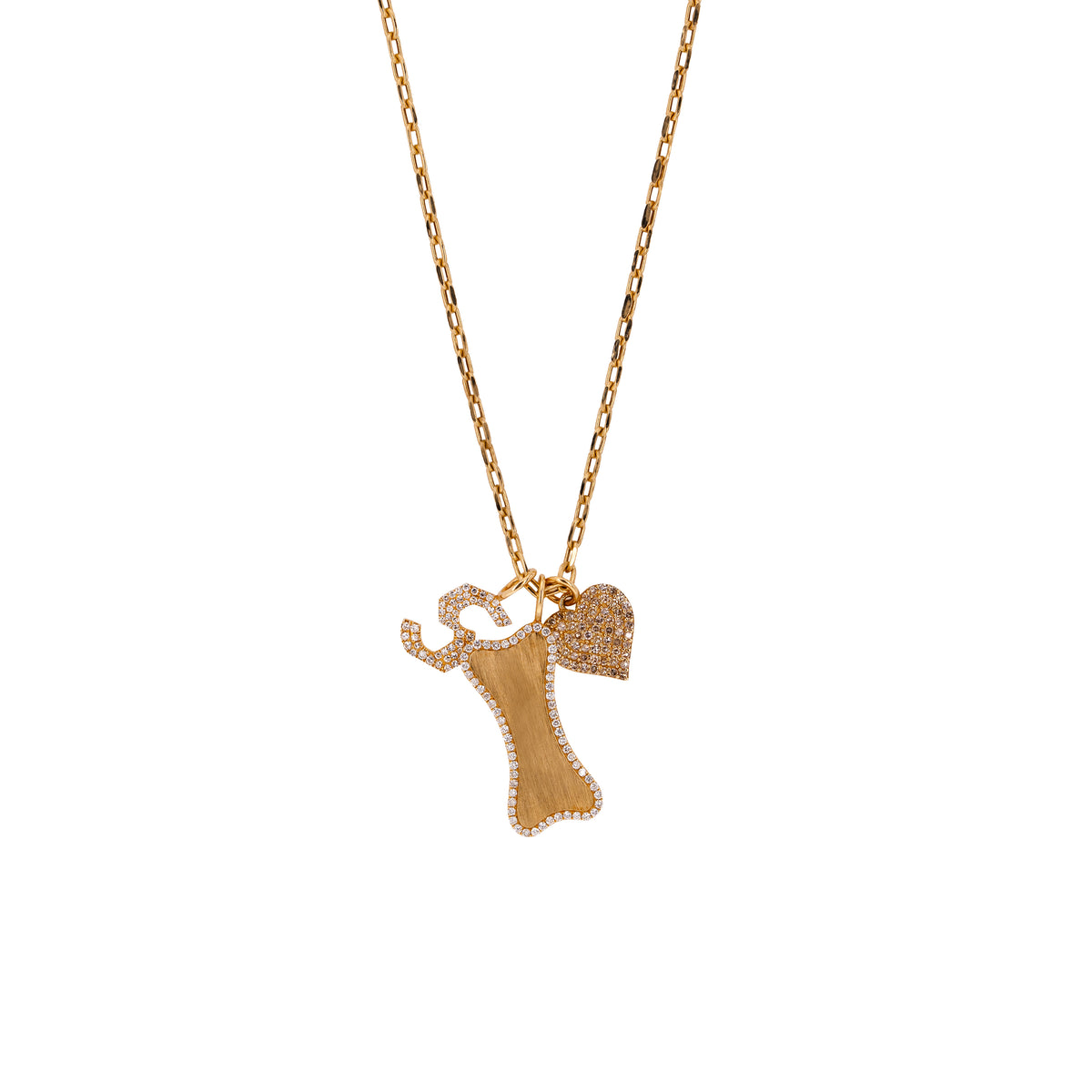 A 14K yellow gold charm necklace with a white diamond alphabet pendant, Small Diamond Dog Bone Pendant, and a diamond heart pendant.